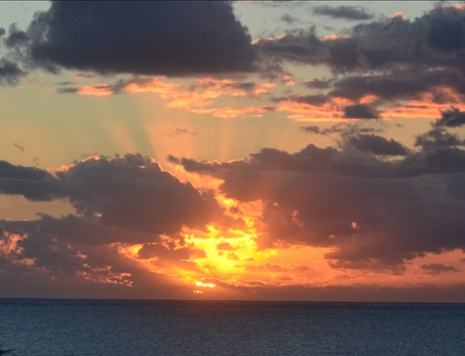 A view of the sunrise from our balcony at Moon Palace, Canacun