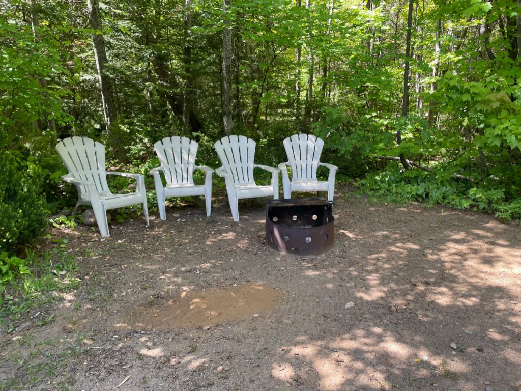 Camp chairs around fire pit