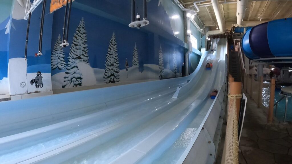 Racing in the belly slides at Avalanche Bay Water Park.
