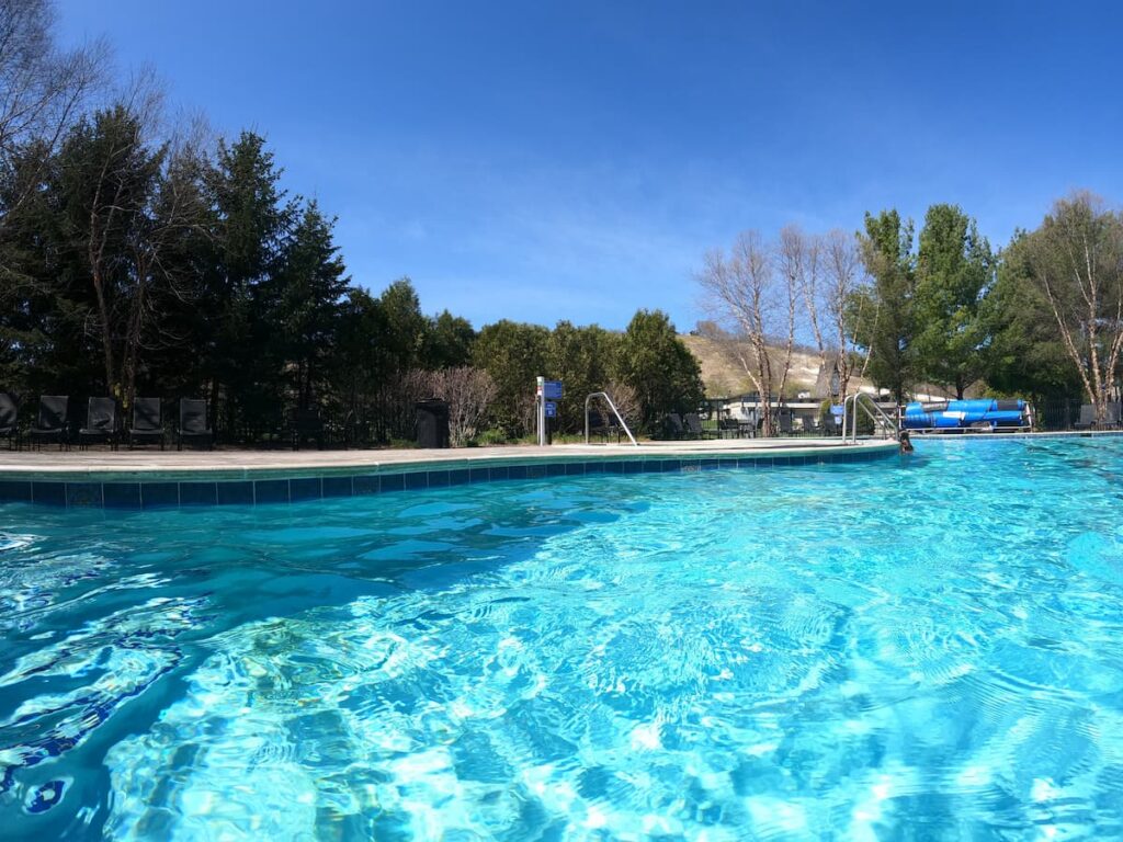 The heated outdoor pool is a great place to swim during spring at Boyne Mountain.