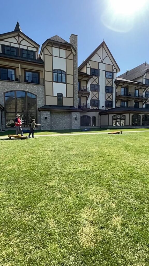 Playing corn hole at Boyne Mountain Resort.