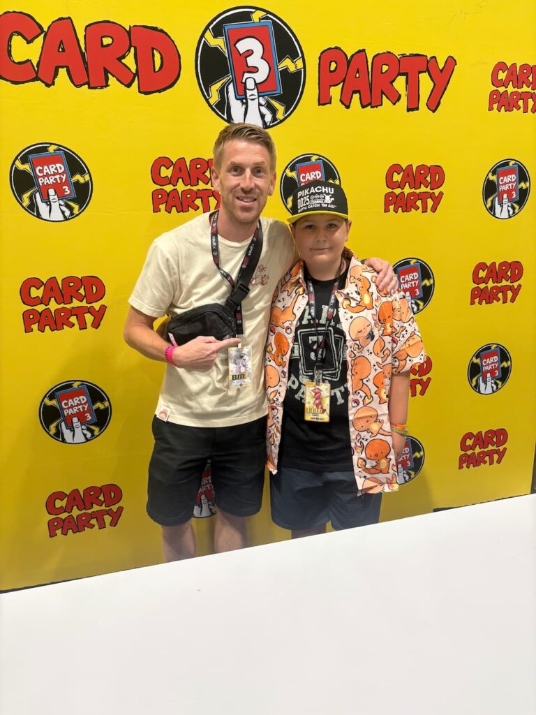 Fan posing with Danny Phantump at Card Party 3 in Tampa, both smiling during the lively meet and greet event.