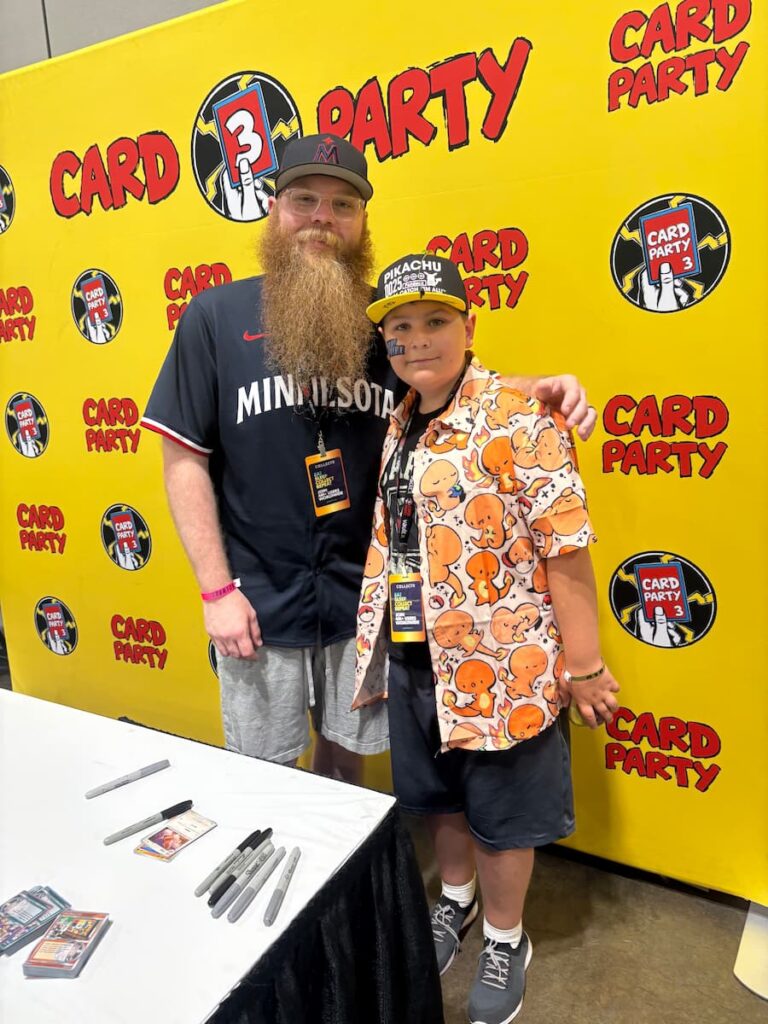 Fan posing with PokeBeard at Card Party 3 in Tampa, both smiling during a memorable meet and greet moment.