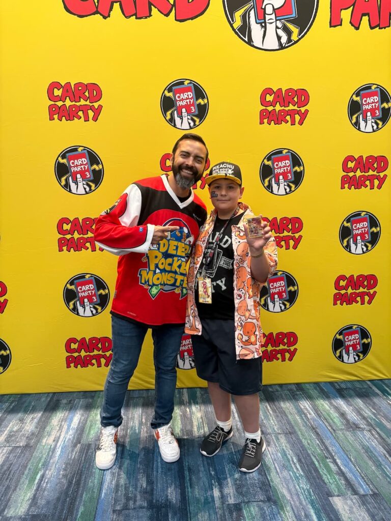 Fan meeting Pat Flynn, also known as Deep Pocket Monster, at Card Party 3 in Tampa — both smiling and posing for a photo at the event.