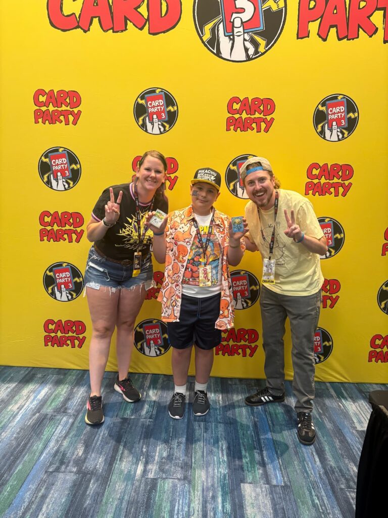 Excited fan meeting Real Breaking Nate and Marie at Card Party 3 in Tampa, smiling together for a photo during the event.